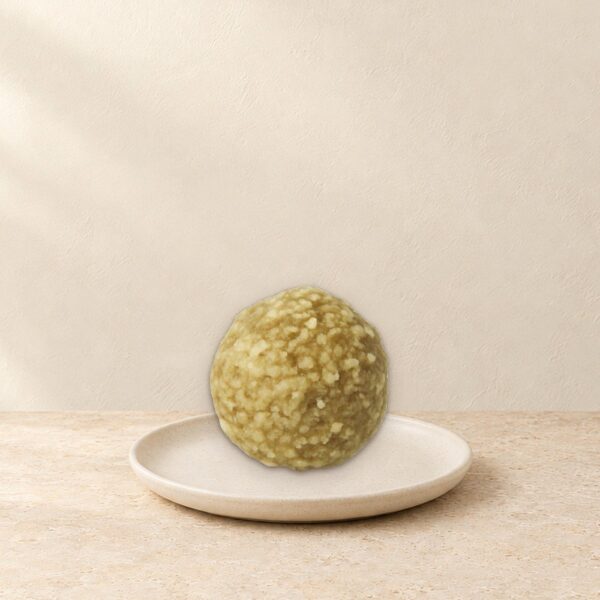 Date balls filled with pretzel spread